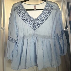 Lightweight, light blue Justice top.  Size 18/20 girls